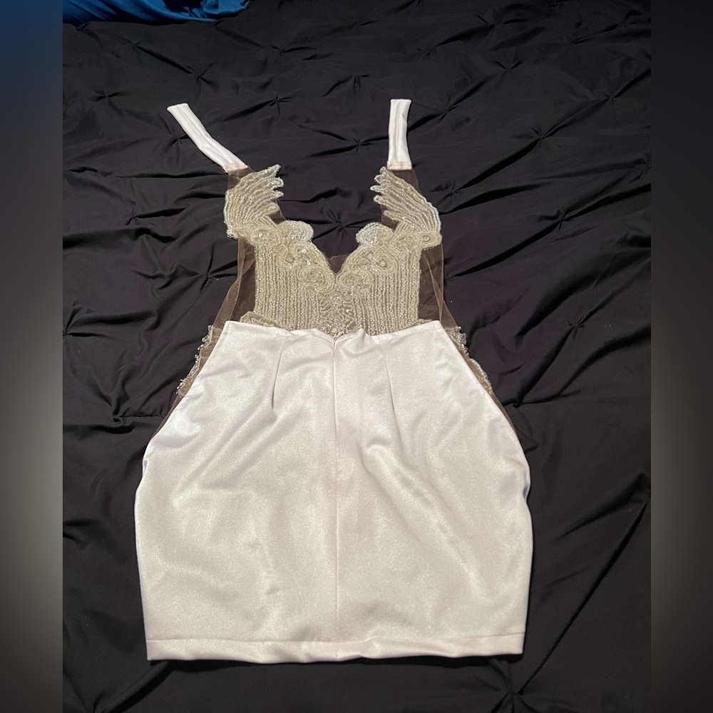 This dress is custom made. It’s very good for special occasions birthdays, etc. - Picture 2 of 2